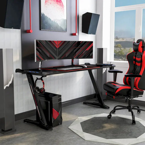 Bureau de gaming noir en acier de 67 pouces avec éclairage LED et ports USB